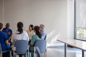 Healthcare professionals and community members in discussion