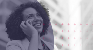woman similing while talking on the phone